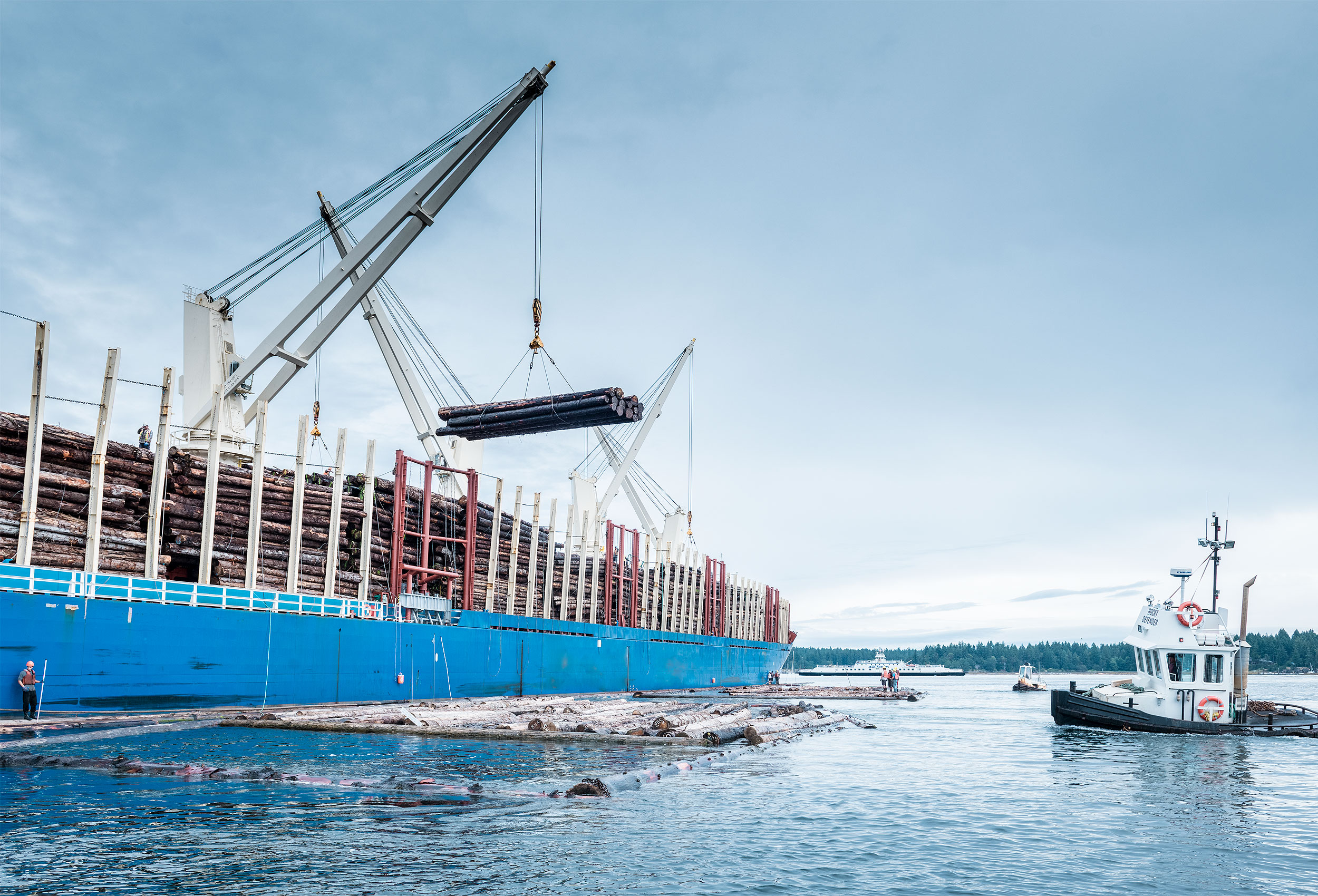 Loading ship with lumber by corporate industrial photographer Kristopher Grunert